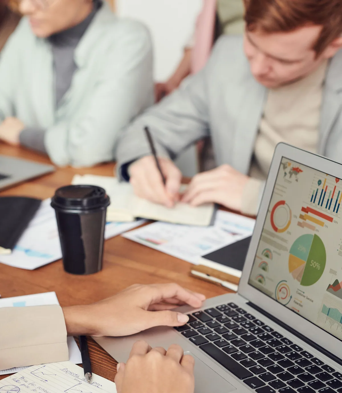 Business team reviewing operational dashboards and performance data